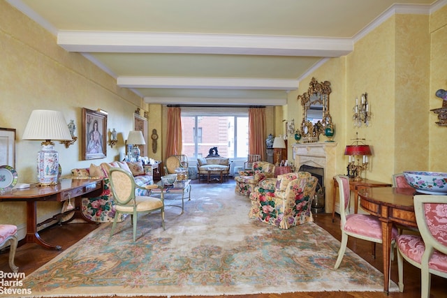 living room with beamed ceiling, ornamental molding, and hardwood / wood-style floors