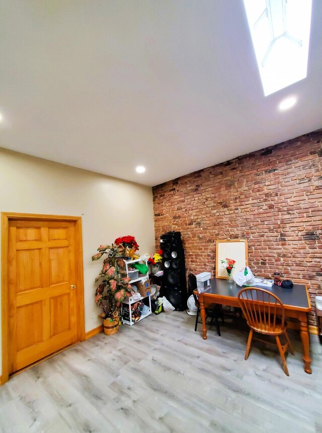 21 Charlotte St, New York City, NY 11385 - office featuring wood finished floors, recessed lighting, baseboards, and a skylight