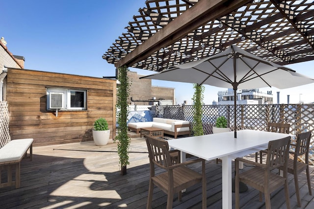 wooden terrace with an outdoor hangout area, a pergola, and outdoor dining area