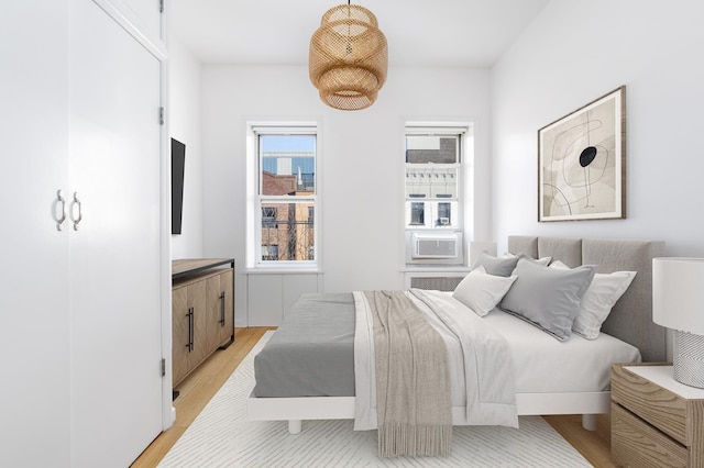 236 E 6th St Unit 5E, New York City, NY 10003 - bedroom featuring cooling unit and light wood-style floors
