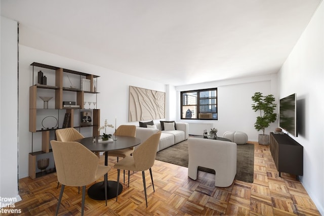 living room featuring parquet flooring