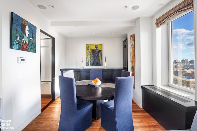 dining area featuring wood-type flooring