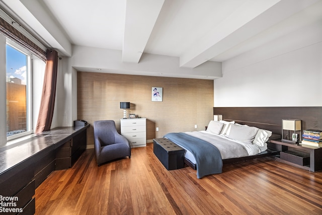 bedroom featuring wood finished floors