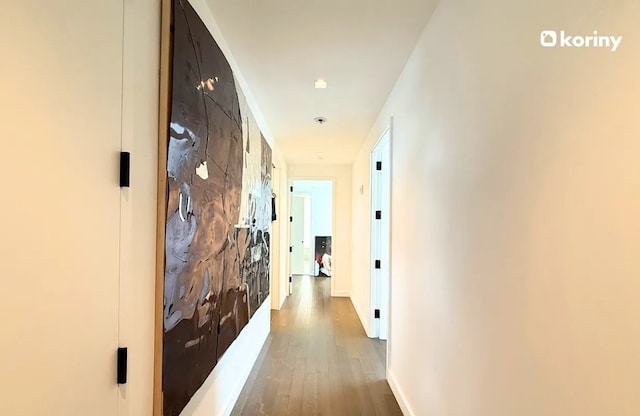 hall featuring hardwood / wood-style flooring