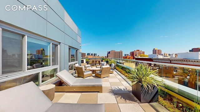 171 W 131st St Unit 304, New York City, NY 10027 - balcony with a city view and an outdoor living space