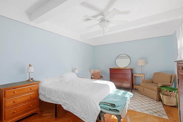 bedroom with beam ceiling and a ceiling fan