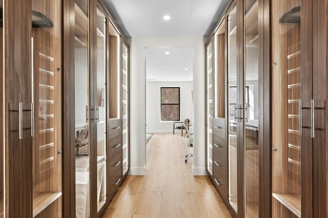 hallway featuring light hardwood / wood-style flooring