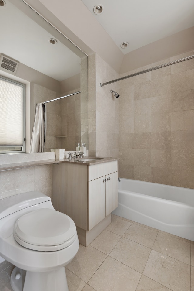 bathroom featuring shower / bath combo, visible vents, toilet, tile patterned flooring, and vanity