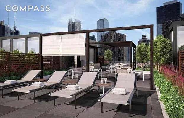 540 W 49th St Unit 406N, New York City, NY 10019 - view of patio / terrace with a view of skyline