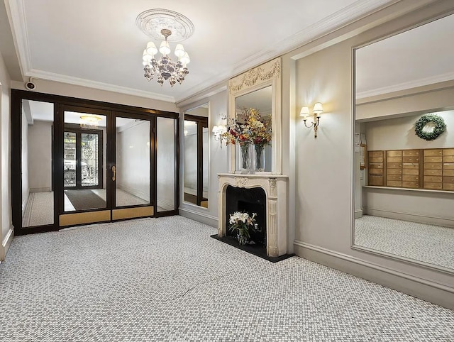 living area featuring mail area, crown molding, french doors, carpet floors, and a chandelier