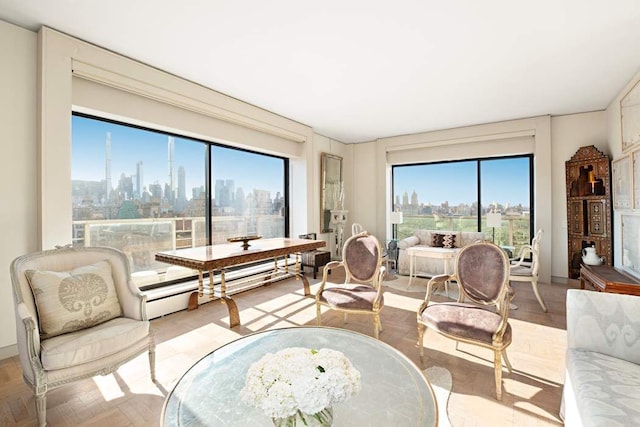 50 E 79th St Pha, Pha, New York City, NY 10075 - sunroom with baseboard heating and a view of skyline