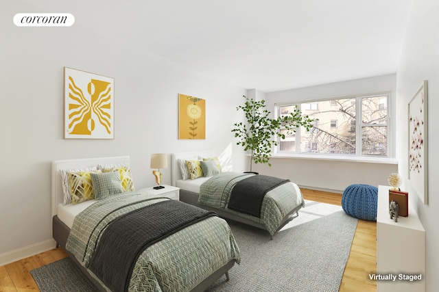 bedroom featuring wood-type flooring