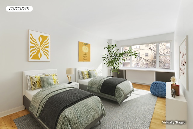 bedroom featuring hardwood / wood-style flooring