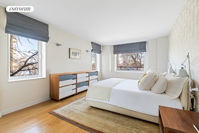 bedroom featuring light wood-type flooring