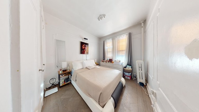 bedroom featuring radiator