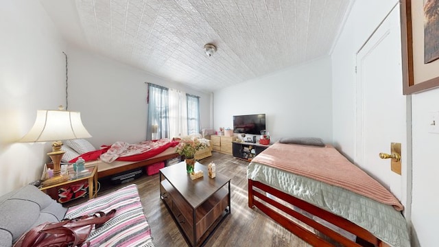 bedroom featuring wood finished floors