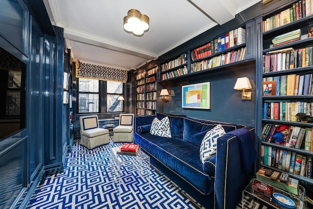 living area with carpet flooring, crown molding, and built in features