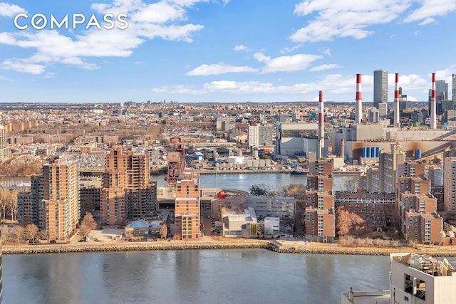 property's view of city with a water view