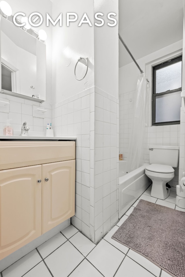 full bath featuring tile patterned floors, tile walls, and shower / bathtub combination with curtain