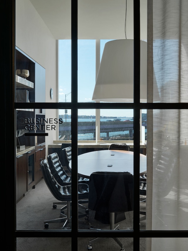 252 S St Unit 66B, New York City, NY 10002 - home office with a water view and carpet