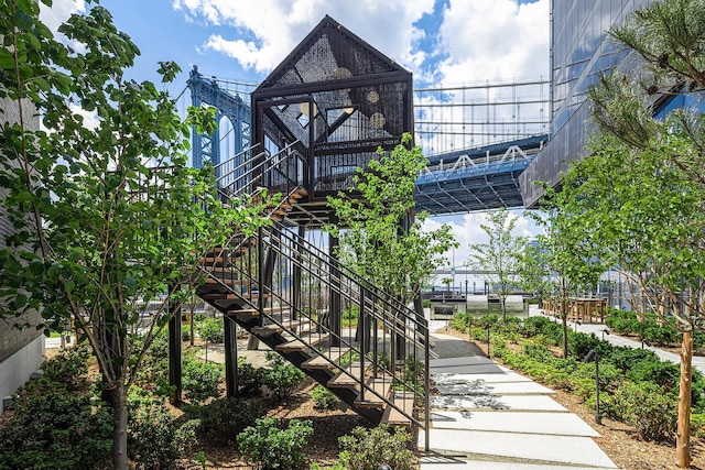 view of property's community featuring stairway