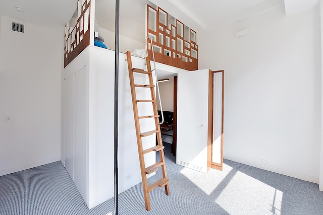 interior space with visible vents and baseboards