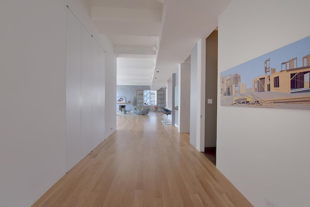 hallway with light wood-type flooring