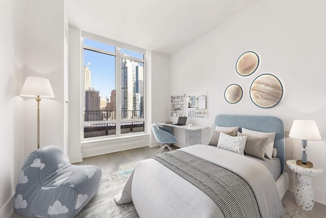 bedroom with light hardwood / wood-style floors