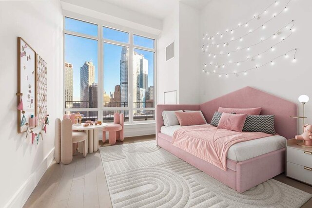 bedroom featuring light hardwood / wood-style flooring