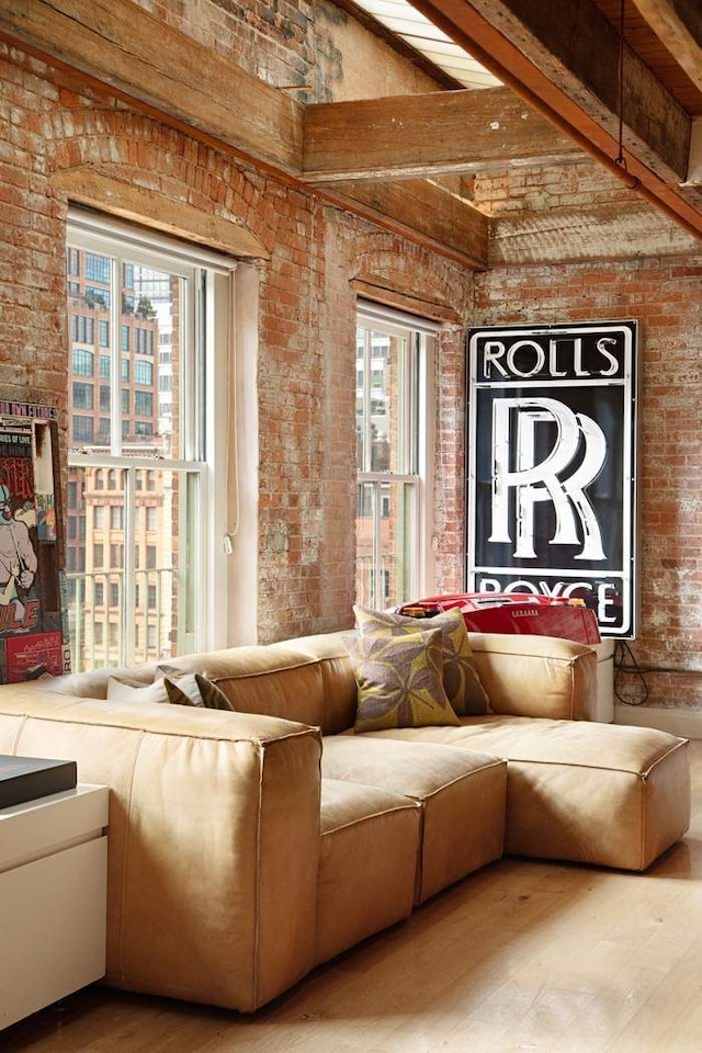 28 Laight St Unit 6Ab, New York City, NY 10013 - interior space with hardwood / wood-style flooring, brick wall, and plenty of natural light