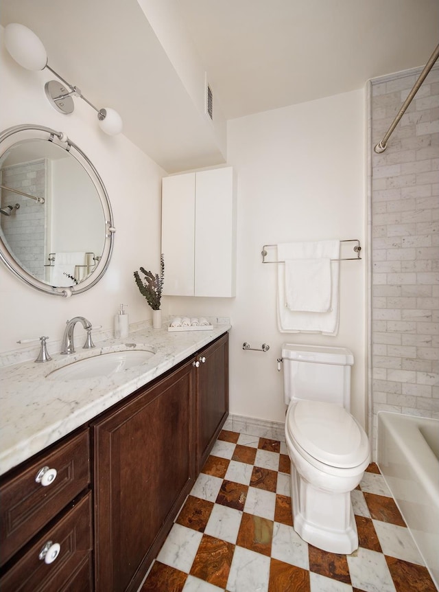 bathroom featuring tile patterned floors, visible vents, toilet, shower / washtub combination, and vanity