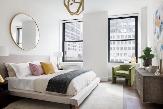 bedroom with light hardwood / wood-style flooring