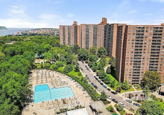 birds eye view of property with a view of city