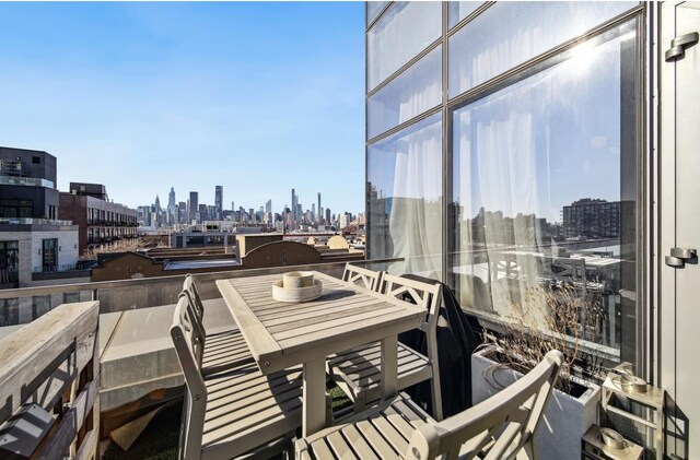 balcony featuring a city view