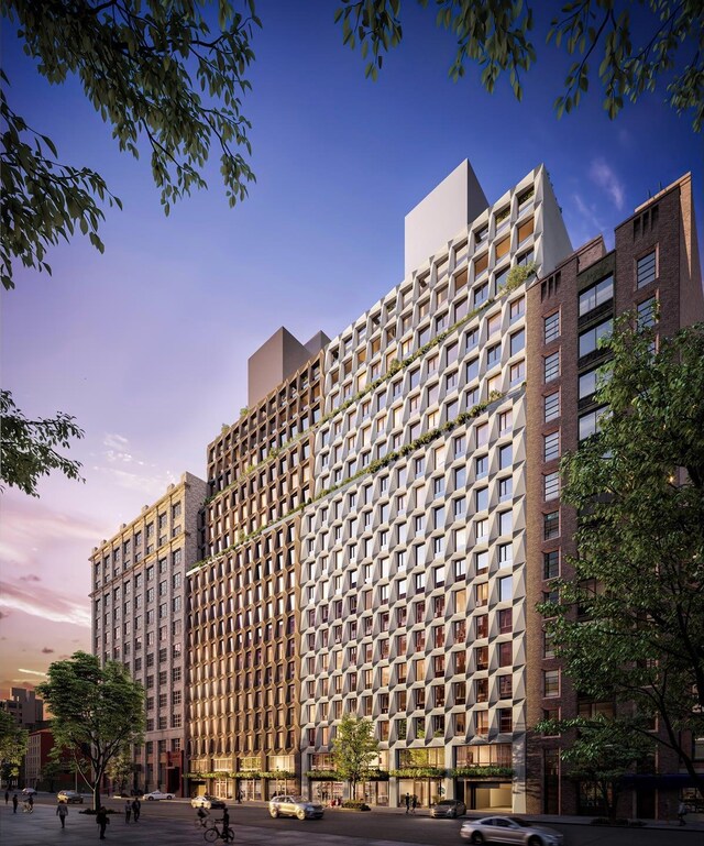 215 W 28th St Unit 2C, New York City, NY 10001 - view of property at dusk