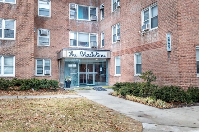 view of building exterior featuring cooling unit