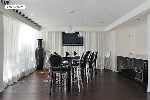 dining area featuring dark wood finished floors