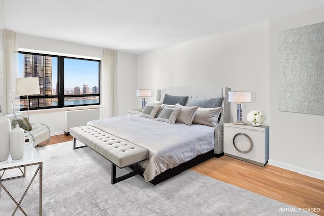 bedroom featuring hardwood / wood-style floors