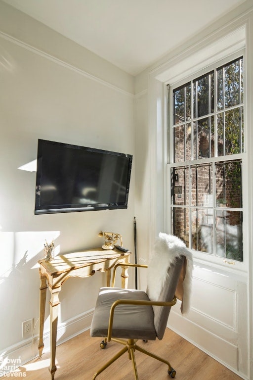 sitting room featuring light hardwood / wood-style floors