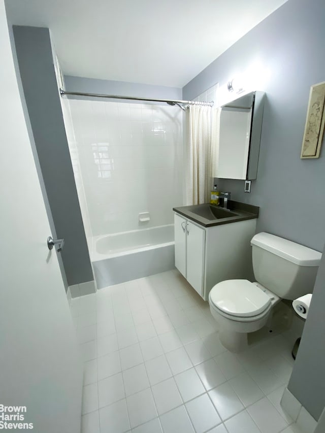 full bath with toilet, shower / bathtub combination with curtain, vanity, and tile patterned floors