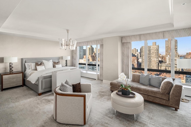 carpeted bedroom featuring a city view, a chandelier, and crown molding