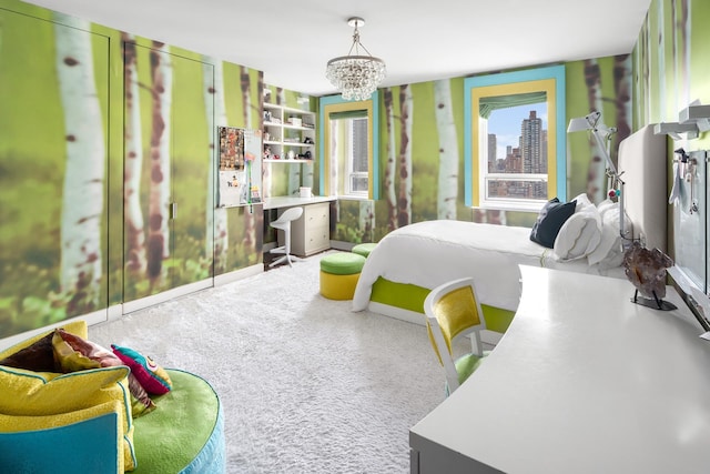 carpeted bedroom with a notable chandelier