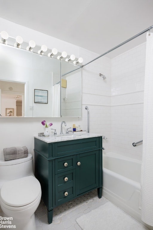 full bathroom featuring vanity, toilet, and shower / bath combo with shower curtain