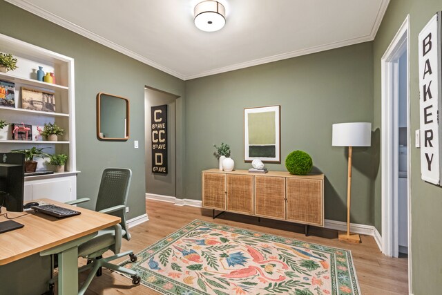 office with crown molding and hardwood / wood-style floors