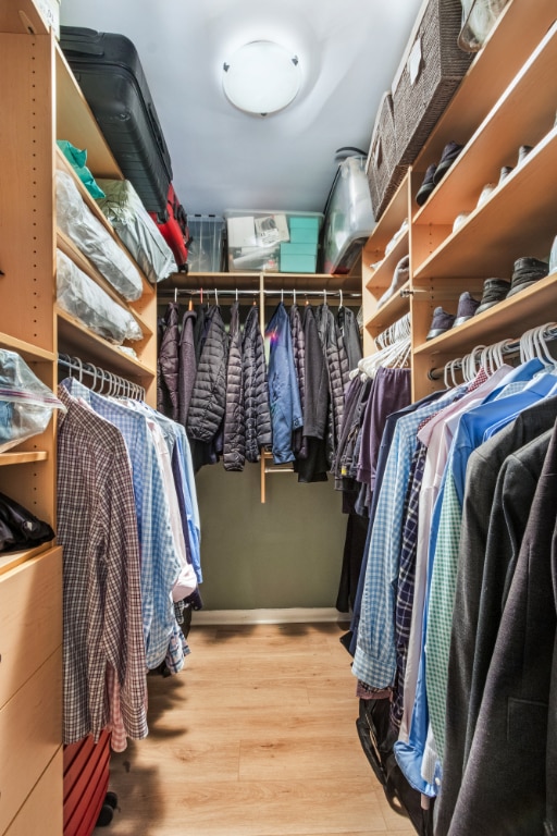 walk in closet featuring wood-type flooring