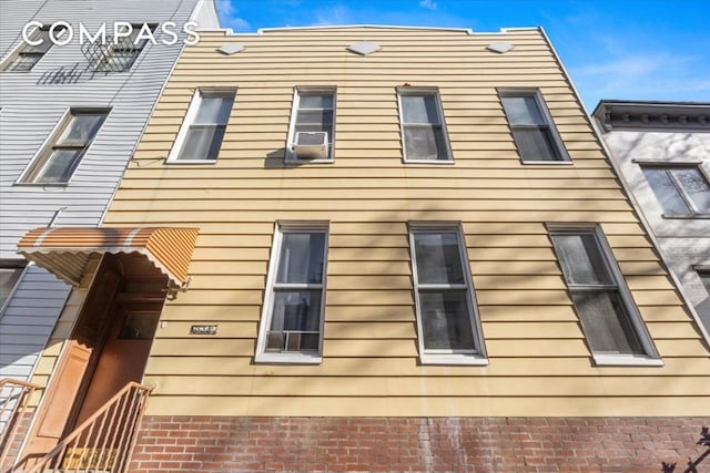 view of property exterior with cooling unit