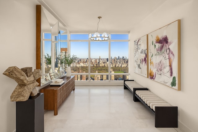 interior space with an inviting chandelier and a city view