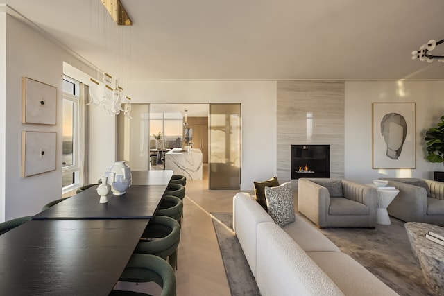 living room featuring a premium fireplace