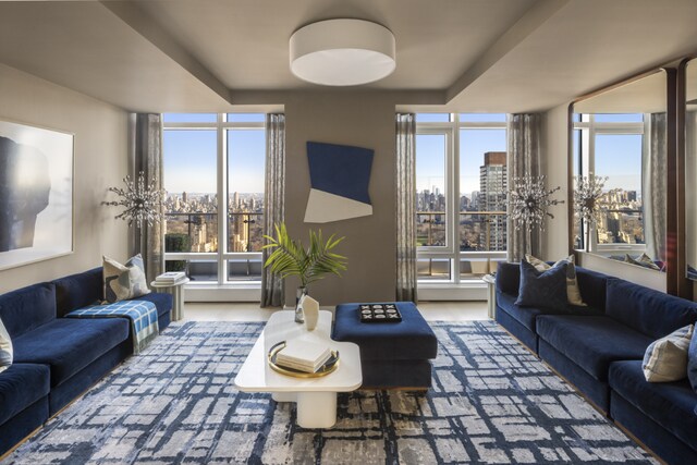 living room featuring a wall of windows