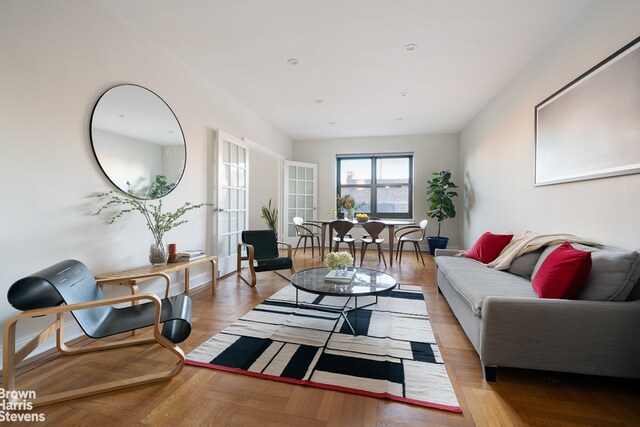 living room with parquet flooring